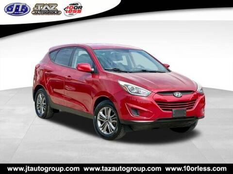 2014 Hyundai Tucson for sale at J T Auto Group in Sanford NC
