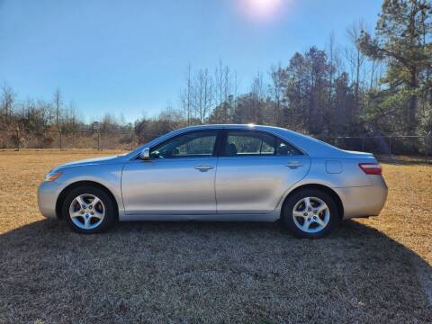 2007 Toyota Camry for sale at Poole Automotive in Laurinburg NC