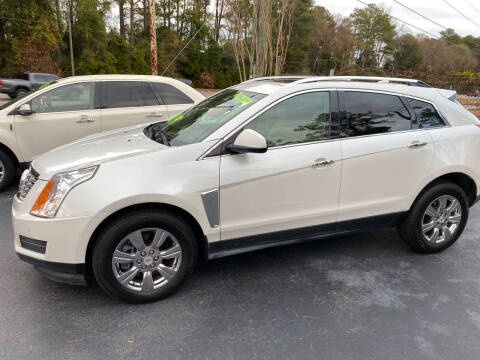 2014 Cadillac SRX for sale at TOP OF THE LINE AUTO SALES in Fayetteville NC