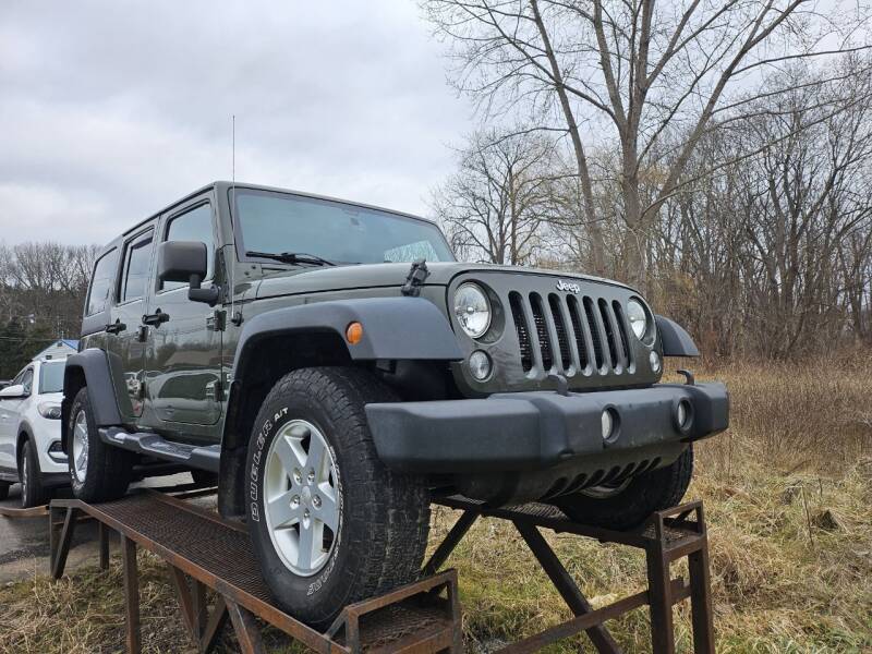 2015 Jeep Wrangler Unlimited for sale at JD Motors in Fulton NY