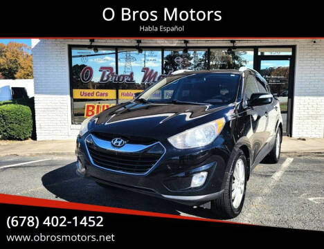 2011 Hyundai Tucson for sale at O Bros Motors in Marietta GA