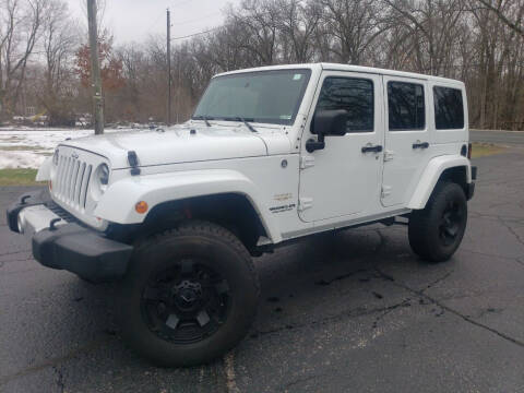 2012 Jeep Wrangler Unlimited for sale at Depue Auto Sales Inc in Paw Paw MI