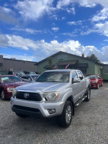 2013 Toyota Tacoma for sale at Velocity Autos in Winter Park FL