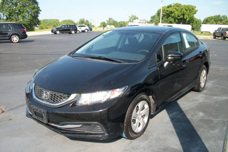 2015 Honda Civic for sale at The Garage Auto Sales and Service in New Paris OH