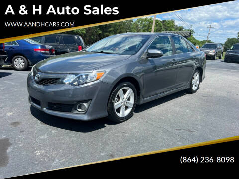 2014 Toyota Camry for sale at A & H Auto Sales in Greenville SC