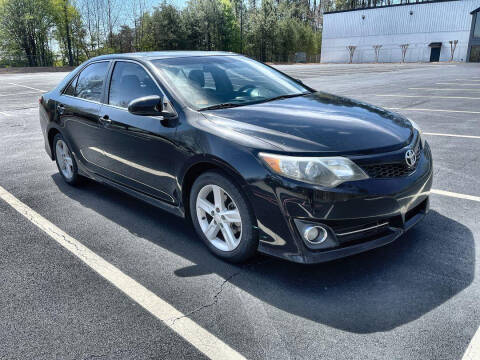 2012 Toyota Camry for sale at CU Carfinders in Norcross GA