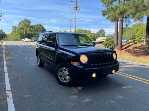 2014 Jeep Patriot for sale at THE AUTO FINDERS in Durham NC
