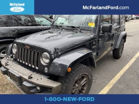 2016 Jeep Wrangler Unlimited for sale at MC FARLAND FORD in Exeter NH