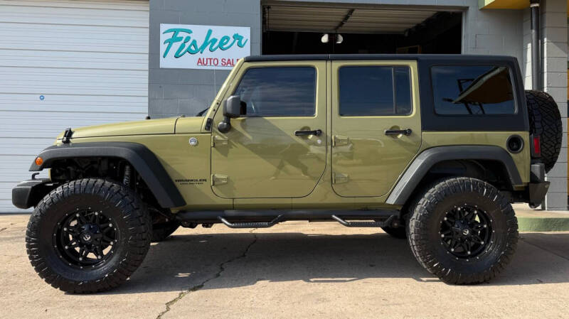 2013 Jeep Wrangler Unlimited for sale at Fisher Auto Sales in Longview TX