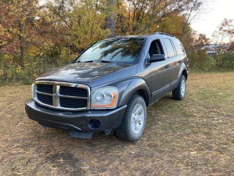 2004 Dodge Durango for sale at Expressway Auto Auction in Howard City MI