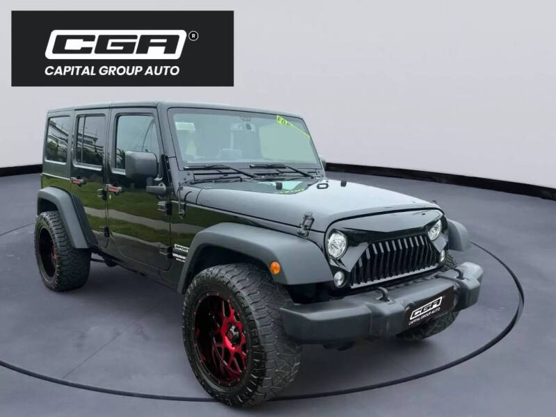 Used 2017 Jeep Wrangler Unlimited Sport S with VIN 1C4BJWDG2HL652161 for sale in Freeport, NY