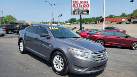 2014 Ford Taurus for sale at FIRST CHOICE AUTO Inc in Middletown OH