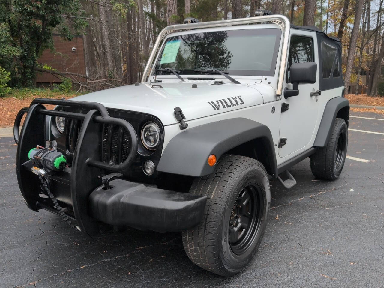 2015 Jeep Wrangler for sale at Capital Motors in Raleigh, NC