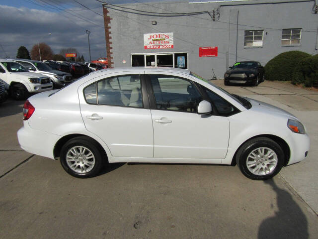 2013 Suzuki SX4 for sale at Joe s Preowned Autos in Moundsville, WV