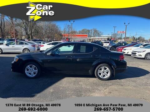 2011 Dodge Avenger for sale at Car Zone in Otsego MI