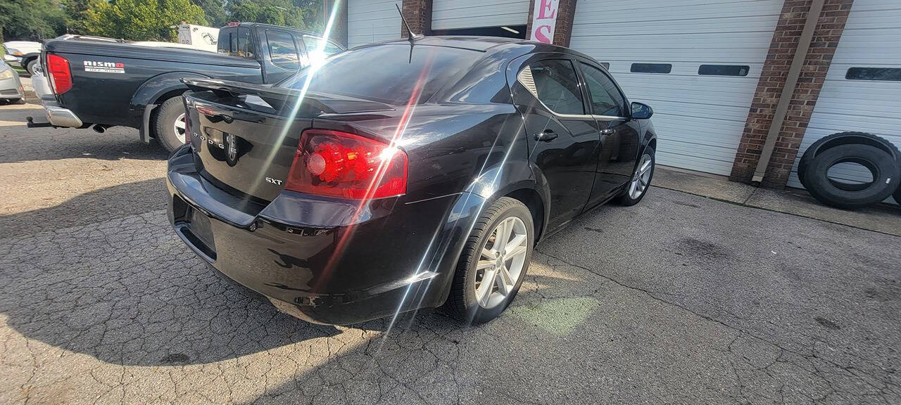 2013 Dodge Avenger for sale at Cars For Less in Clarksville, TN