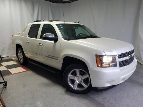 2011 Chevrolet Avalanche for sale at Tradewind Car Co in Muskegon MI