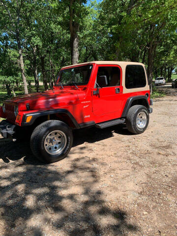 2002 Jeep Wrangler for sale at BARROW MOTORS in Campbell TX