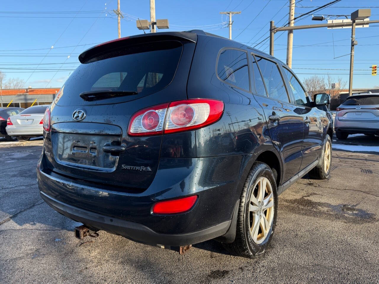 2010 Hyundai SANTA FE for sale at AVS AUTO GROUP LLC in CLEVELAND, OH