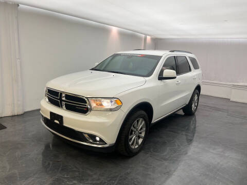 2017 Dodge Durango for sale at Roman's Auto Sales in Warren MI