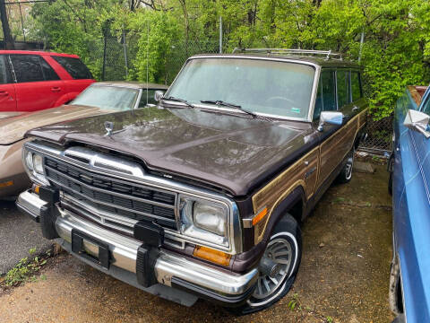 1989 Jeep Grand Wagoneer for sale at Bogie's Motors in Saint Louis MO