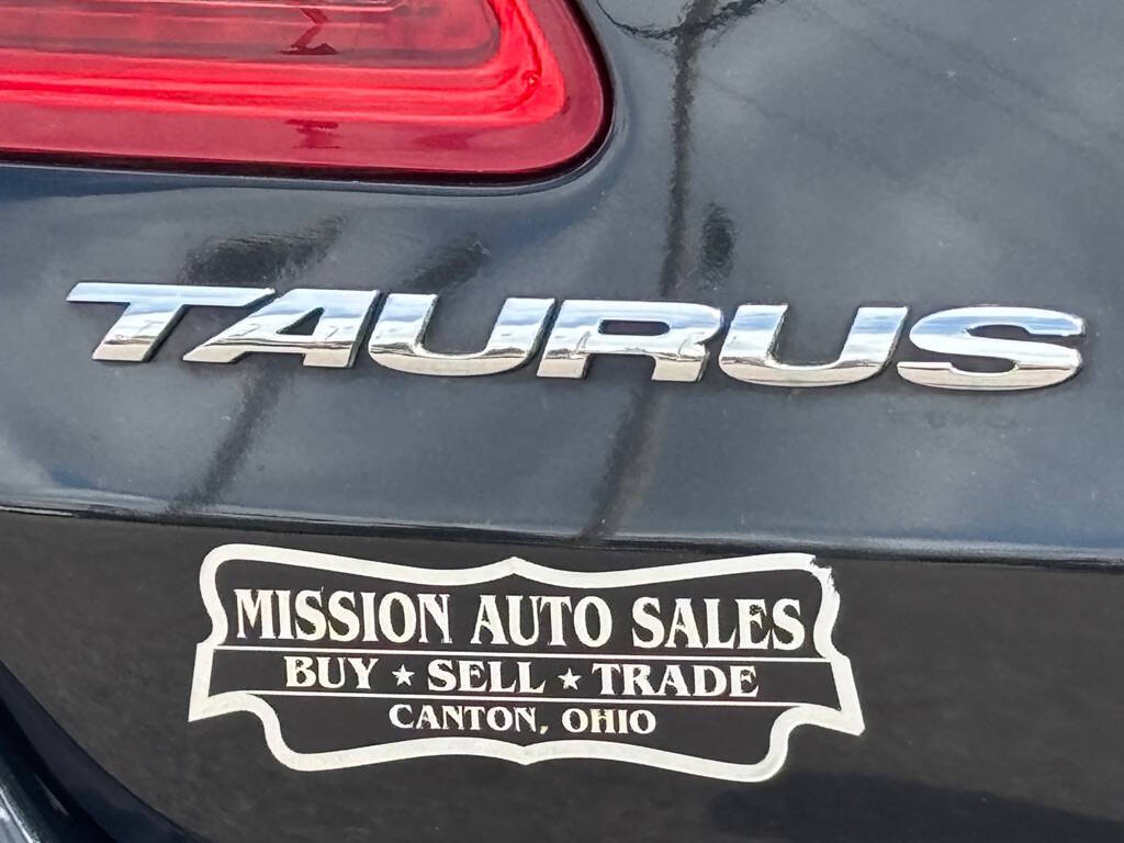 Black 2013 Ford Taurus SHO AWD SHO 4dr Sedan 19