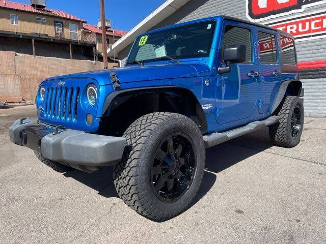 2015 Jeep Wrangler Unlimited for sale at Red Rock Auto Sales in Saint George UT