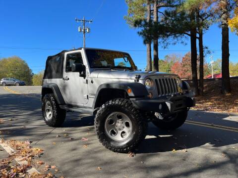 2015 Jeep Wrangler for sale at THE AUTO FINDERS in Durham NC
