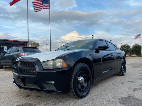 2014 Dodge Charger for sale at Chiefs Auto Group in Hempstead TX