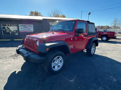 2012 Jeep Wrangler for sale at VILLAGE AUTO MART LLC in Portage IN