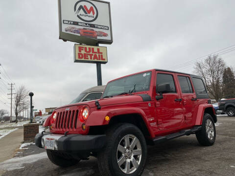 2012 Jeep Wrangler Unlimited for sale at Automania in Dearborn Heights MI