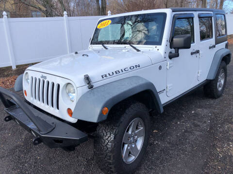 2011 Jeep Wrangler for sale at The Used Car Company LLC in Prospect CT