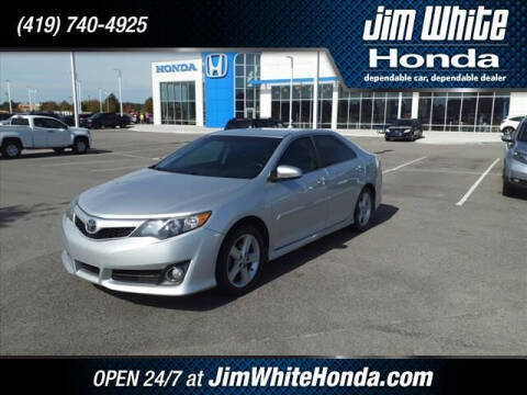 2014 Toyota Camry for sale at The Credit Miracle Network Team at Jim White Honda in Maumee OH