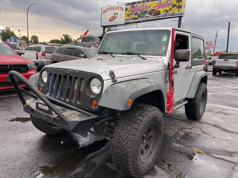 2012 Jeep Wrangler for sale at Mister Auto in Lakewood CO
