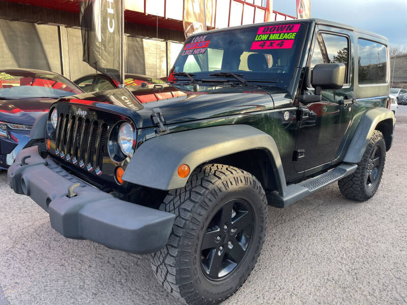 2012 Jeep Wrangler for sale at Duke City Auto LLC in Gallup NM