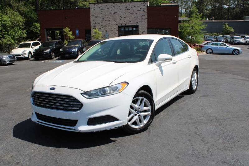 2014 Ford Fusion for sale at Atlanta Unique Auto Sales in Norcross GA