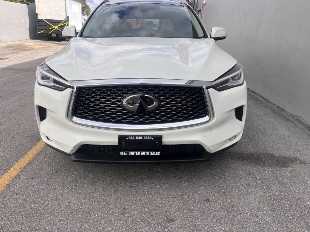 2021 INFINITI QX50 for sale at M & J UNITED AUTO SALES in LAUDERDALE LAKES, FL