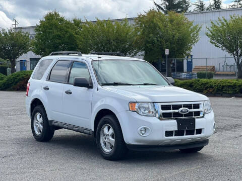 2010 Ford Escape for sale at ICAR MOTORS LLC in Auburn WA