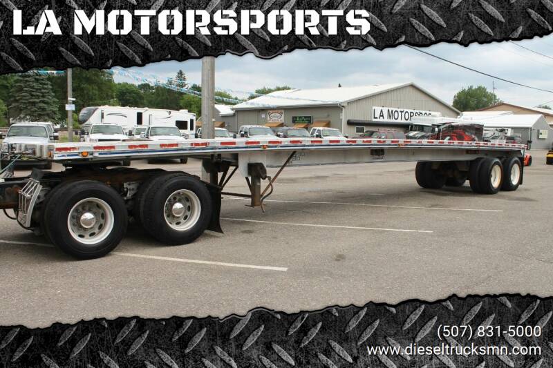 1987 EAST FLATBED for sale at L.A. MOTORSPORTS in Windom MN