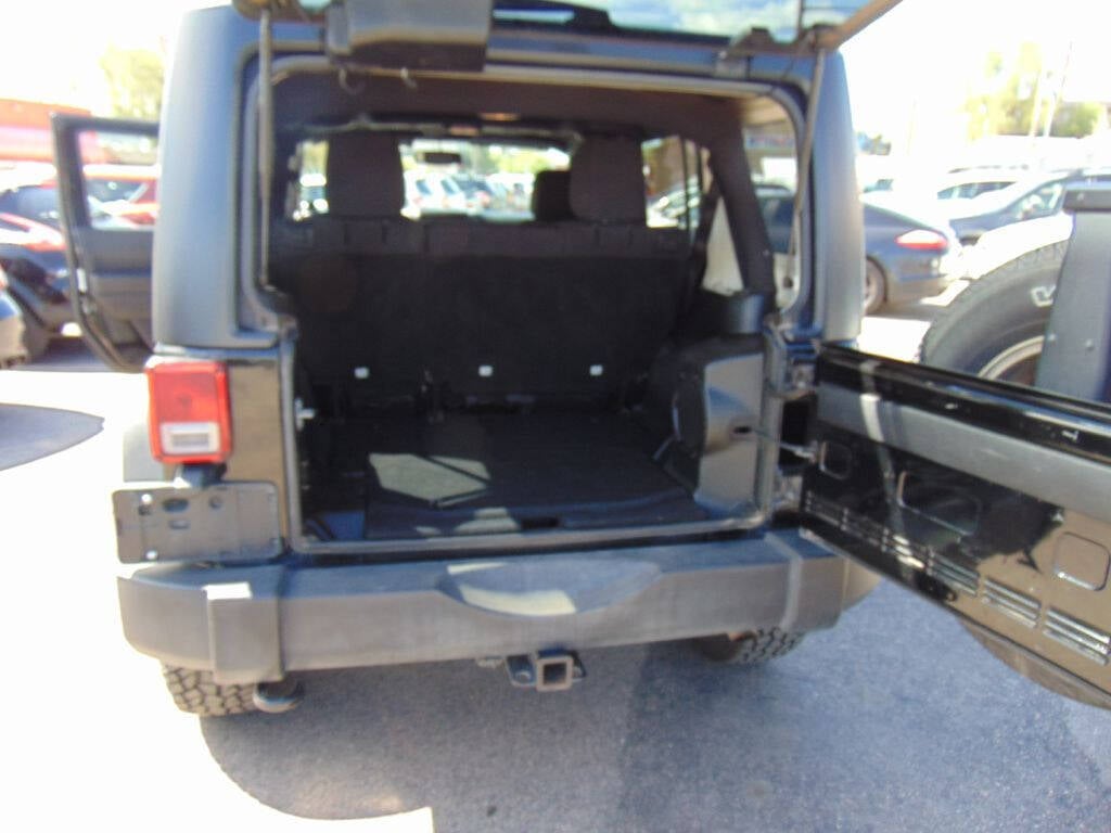 2014 Jeep Wrangler Unlimited for sale at Avalanche Auto Sales in Denver, CO