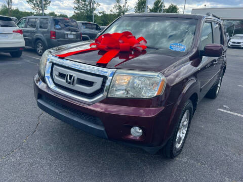 2009 Honda Pilot for sale at Charlotte Auto Group, Inc in Monroe NC