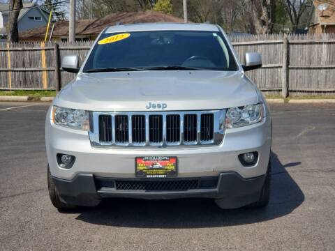 2012 Jeep Grand Cherokee for sale at Revolution Auto Inc in McHenry IL