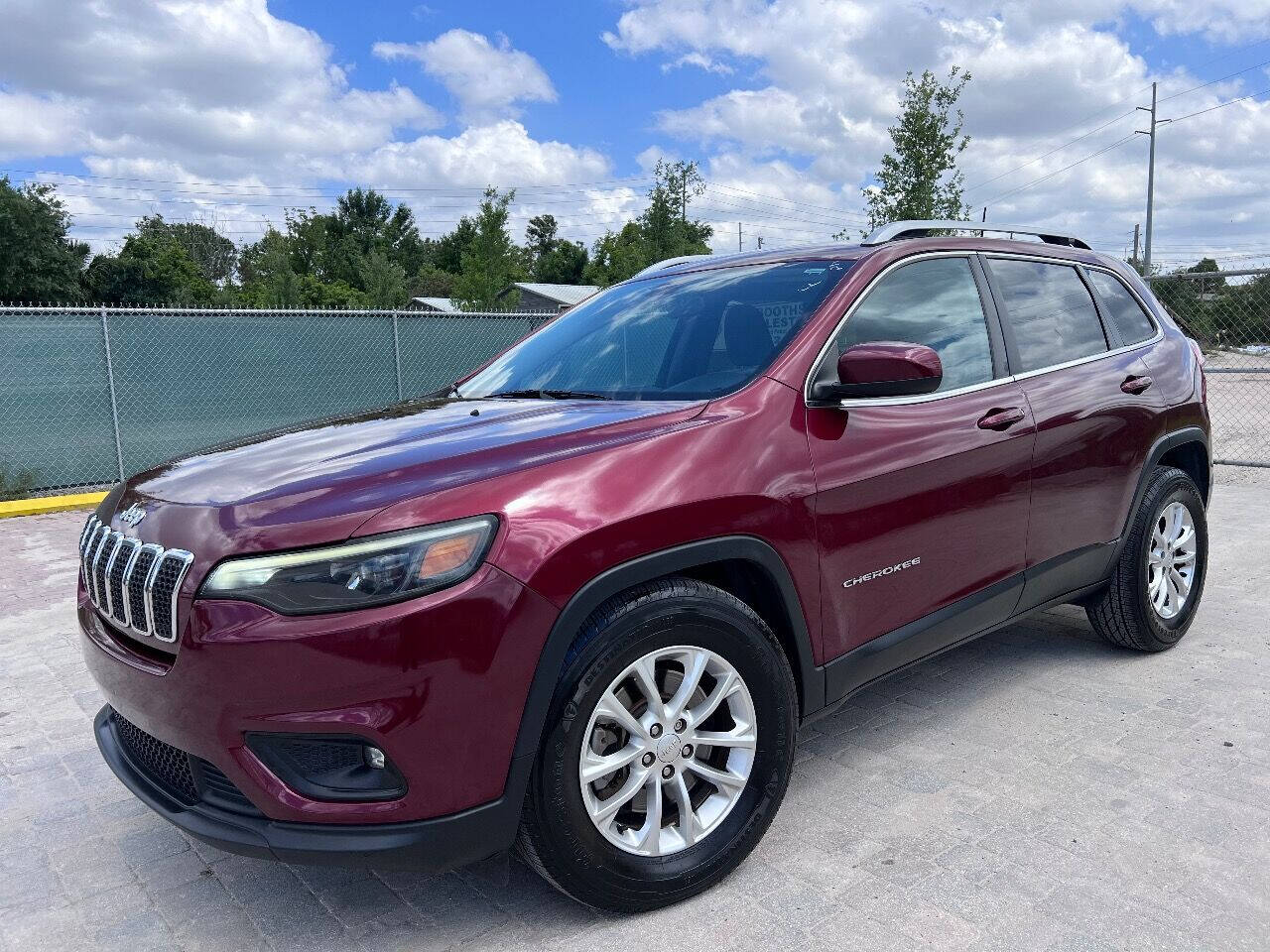 2019 Jeep Cherokee for sale at Auto Dealers Exchange LLC in Apopka, FL