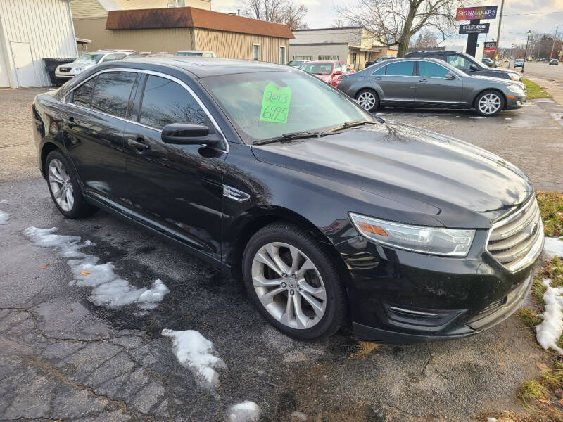 2013 Ford Taurus for sale at Van Kalker Motors in Grand Rapids MI