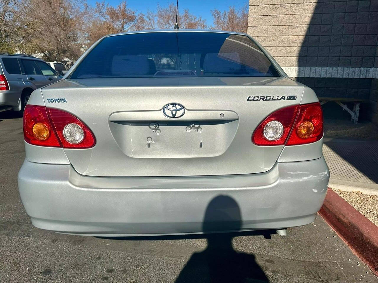 2003 Toyota Corolla for sale at HUDSONS AUTOS in Gilbert, AZ