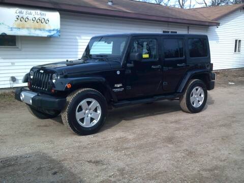 2012 Jeep Wrangler Unlimited for sale at LAKESIDE MOTORS LLC in Houghton Lake MI