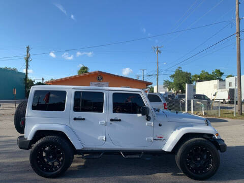 2013 Jeep Wrangler Unlimited for sale at Eden Cars Inc in Hollywood FL
