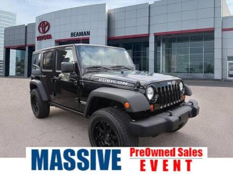 2013 Jeep Wrangler Unlimited for sale at BEAMAN TOYOTA in Nashville TN