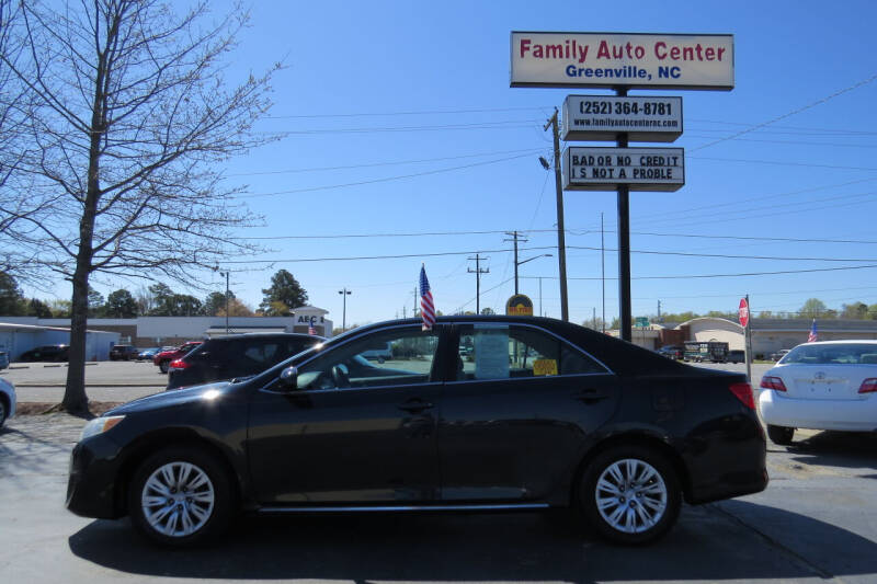 2014 Toyota Camry for sale at FAMILY AUTO CENTER in Greenville NC