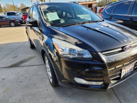 2015 Ford Escape for sale at E and M Auto Sales in Bloomington CA